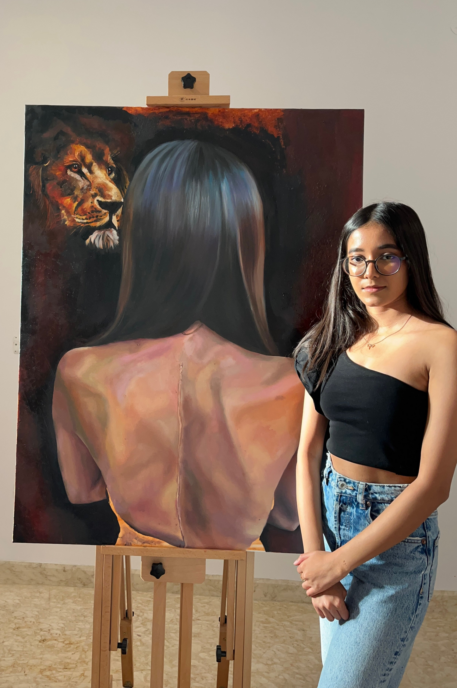 A 4-foot oil painting depicting a human back with a scar in the center, accompanied by the artist on the right. The painting features a deep blood-red background, with the details of the back skillfully executed.